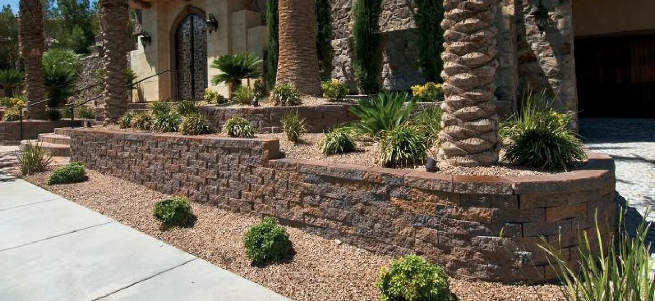 Stacked paver garden wall